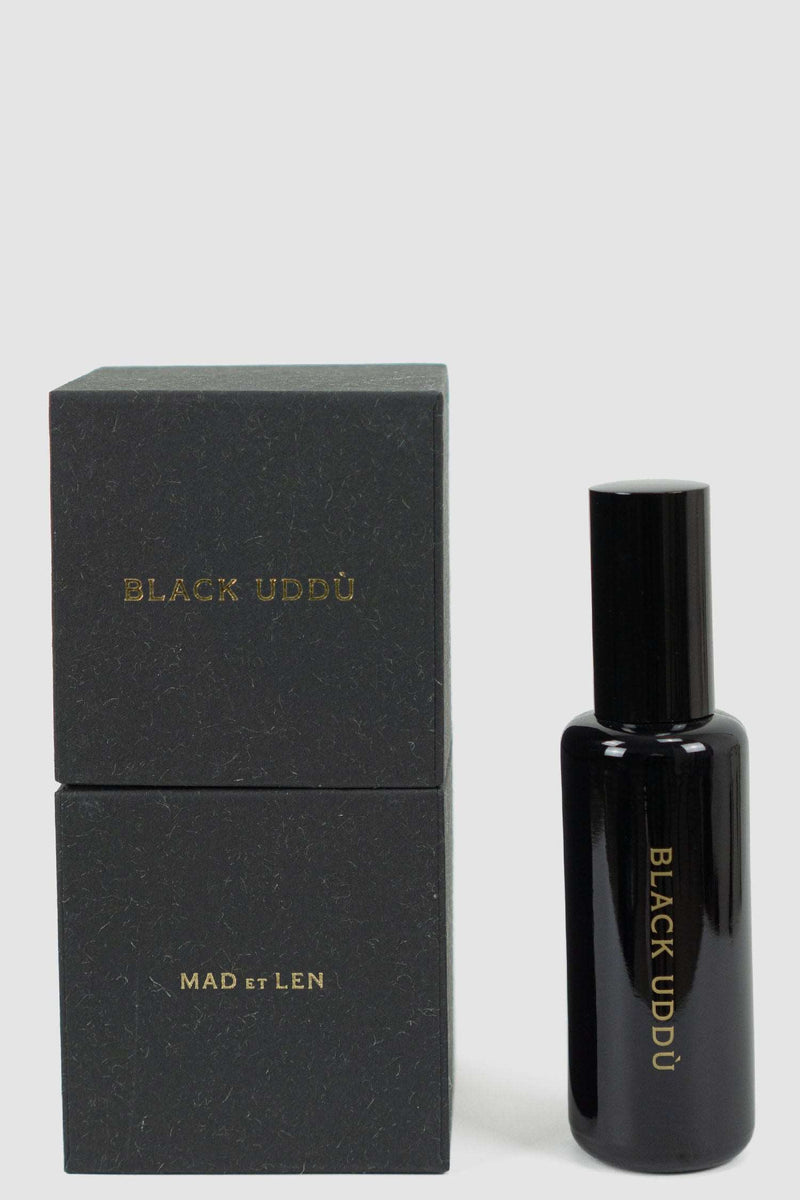 Front view of Black Uddu Eau de Parfum bottle, MAD ET LEN