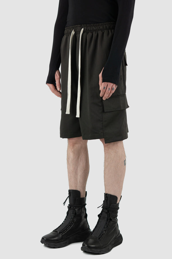 Side view of Black Cargo Shorts Rap Pant Posh showing lower side pockets, XCONCEPT