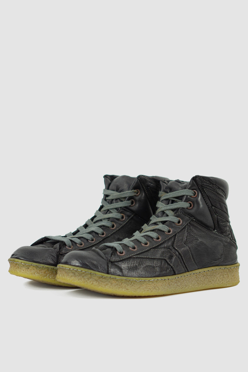 Culture of Brave - front left Black ankle high top leather sneaker for Men from the permanent Collection in object dyed Kangaroo.