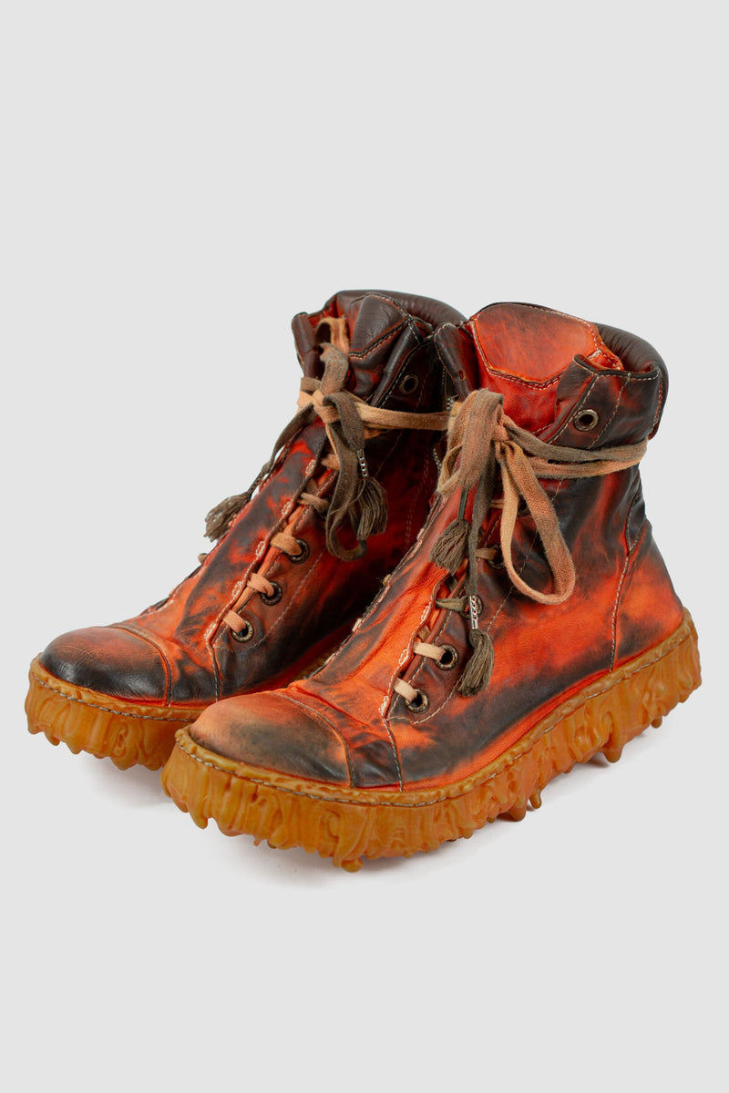 Culture of Brave - Front left view of Melt Clash Lava Red Mid Sneaker.