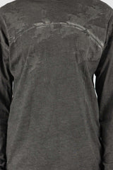 Culture of Brave - Front detail view of black object-dyed seamless organic cotton men's L/S T-shirt, Permanent Collection.