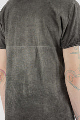 Culture of Brave - Back detail view of grey object-dyed seamless organic cotton men's S/S T-shirt, Permanent Collection.