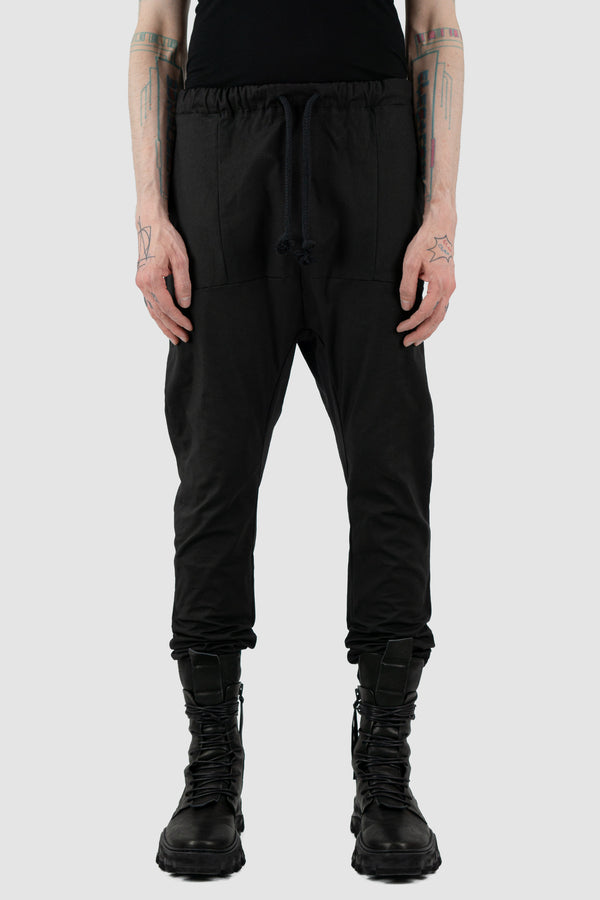 Front view of Black Dawn Jogger Pants for Men with relaxed fit and low crotch, OBECTRA