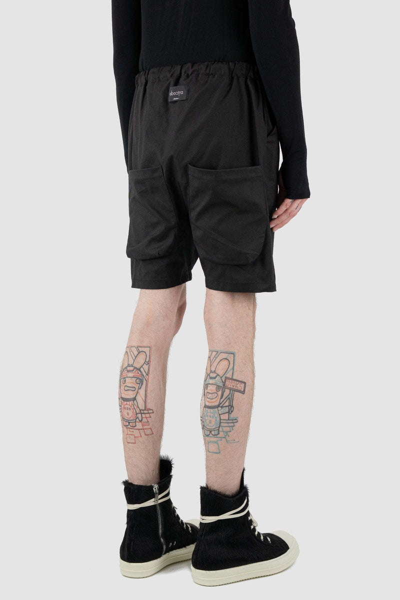 OBECTRA black Dusk cotton shorts from the Permanent Collection featuring a low crotch and back pockets positioned lower, back right view.