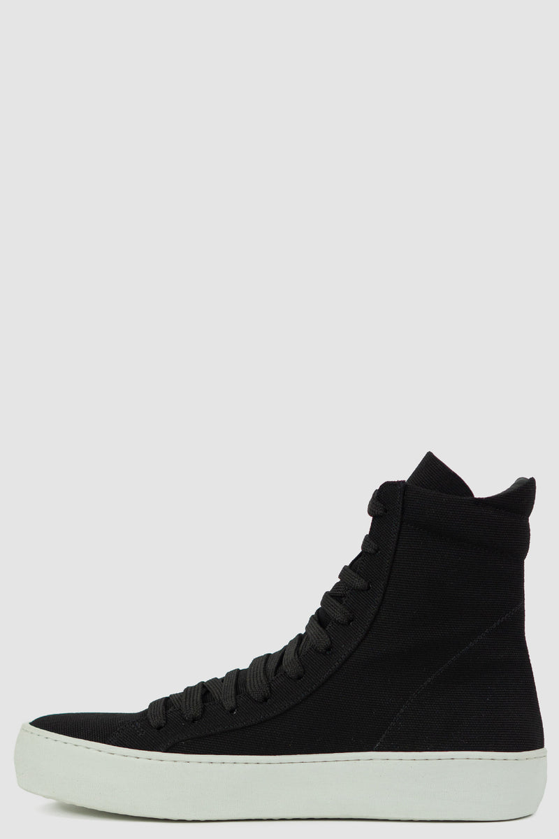 THE LAST CONSPIRACY Black Canvas High Top Sneaker - SS24 Collection | 100% Cotton Canvas | 10 Eyelets Fastening Details, White Buffed Rubber Sole | Made in Portugal | Model is Wearing: 43 | Model Measurements: 182 CM | 63 KG | Product Code: EMANUEL CANVAS B/W