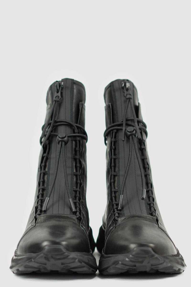 Front view of Futurist Man Hybrid Leather Sneaker Boot with high-top design and hidden zipper, PURO
