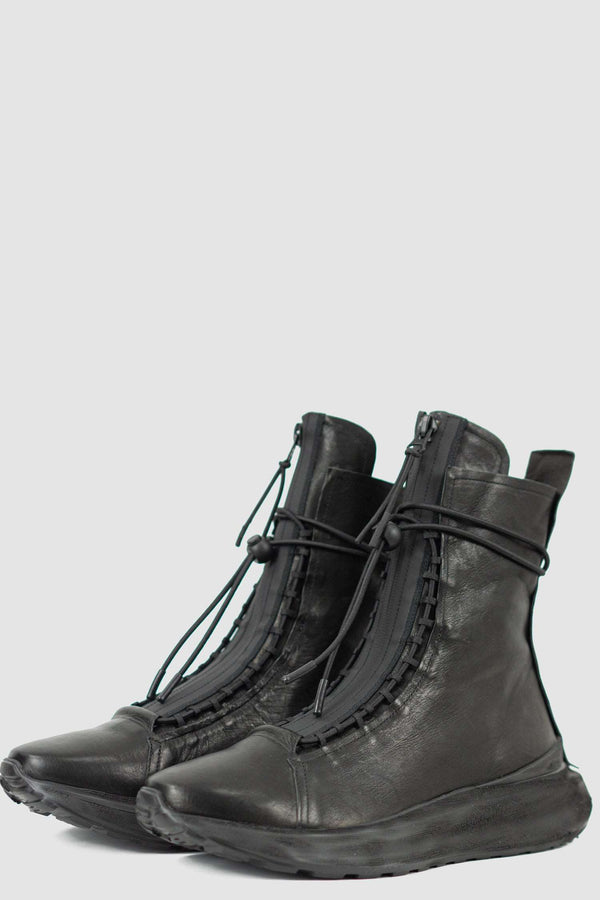 Front left view of Futurist Man Hybrid Leather Sneaker Boot with high-top design and hidden zipper, PURO