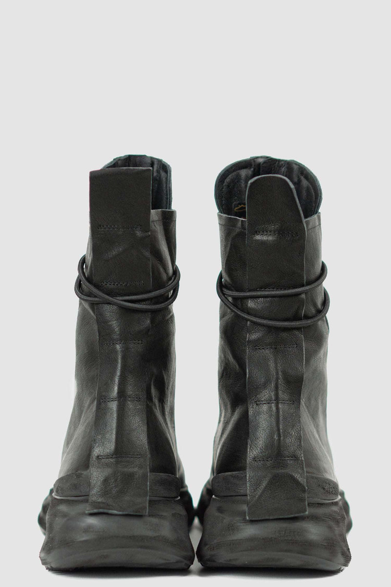 Back view of Futurist Man Hybrid Leather Sneaker Boot with high-top design and hidden zipper, PURO
