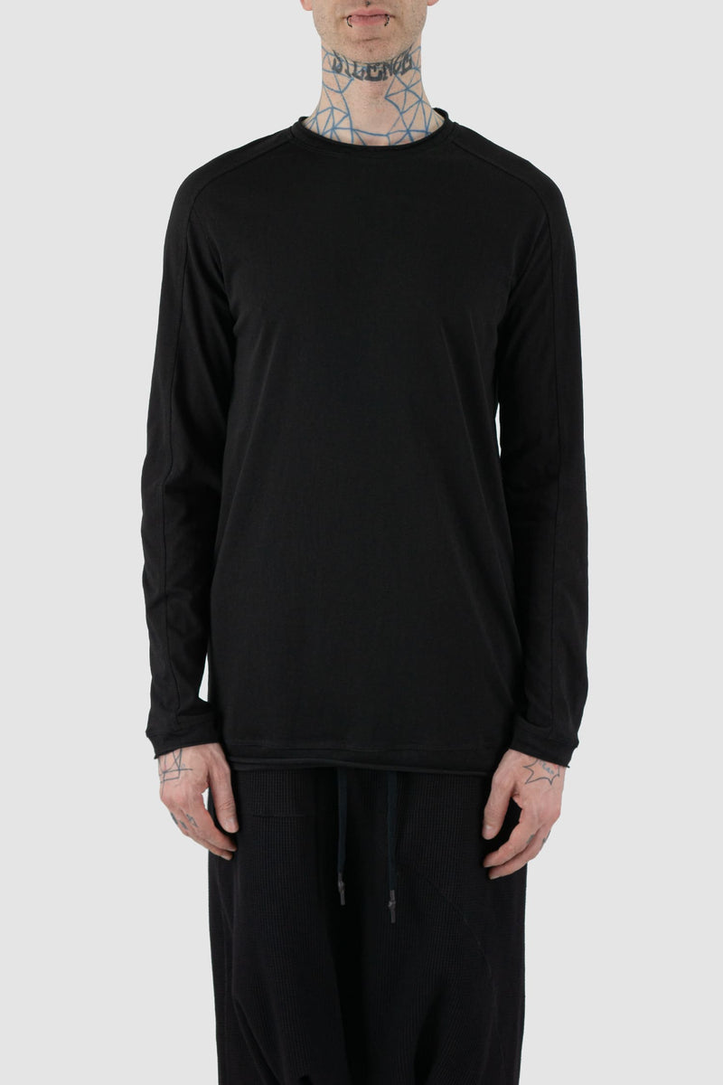 First Aid to the Injured - front view of black cotton raglan long sleeve T-Shirt for men from the FW24 collection with decorative shoulder sections, heavy back and arm seams.