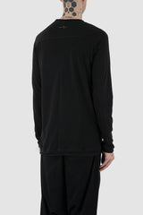 First Aid to the Injured - back side view of black cotton raglan long sleeve T-Shirt for men from the FW24 collection with decorative shoulder sections, heavy back and arm seams.