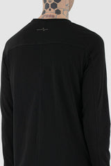 First Aid to the Injured - back logo view of black cotton raglan long sleeve T-Shirt for men from the FW24 collection with decorative shoulder sections, heavy back and arm seams.