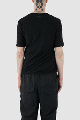 First Aid to the Injured - back view of black twisted double layer jersey T-Shirt for men from the FW24 collection featuring a distinctive twisting bottom and sleeves crafted in a double layer of thin jersey and a center back seam.