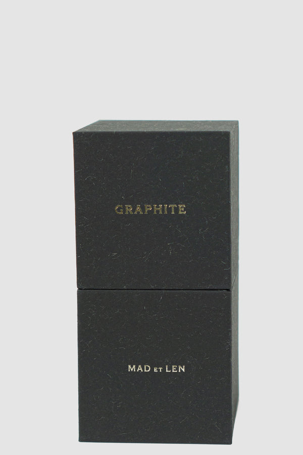 Mad et Len Graphite Scent Eau de Parfum: Sealed in recycled paper box. | Material: 100% Alcohol | Notes: Monochrome Graphite, Chalk Palette, Cropped Wood | 50 ml Version | Made in France.