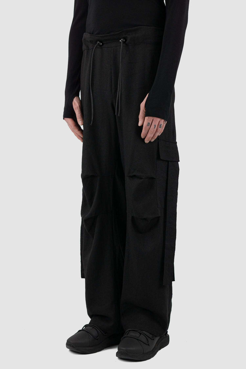Side view of Black Linen-Viscose Cargo Pants for Men with transformable leg length, LA HAINE INSIDE US