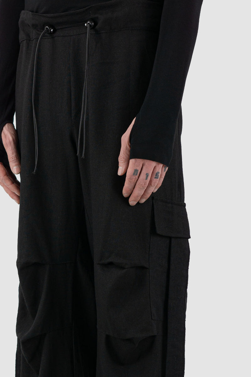 Close up view of Black Linen-Viscose Cargo Pants for Men with transformable leg length, LA HAINE INSIDE US