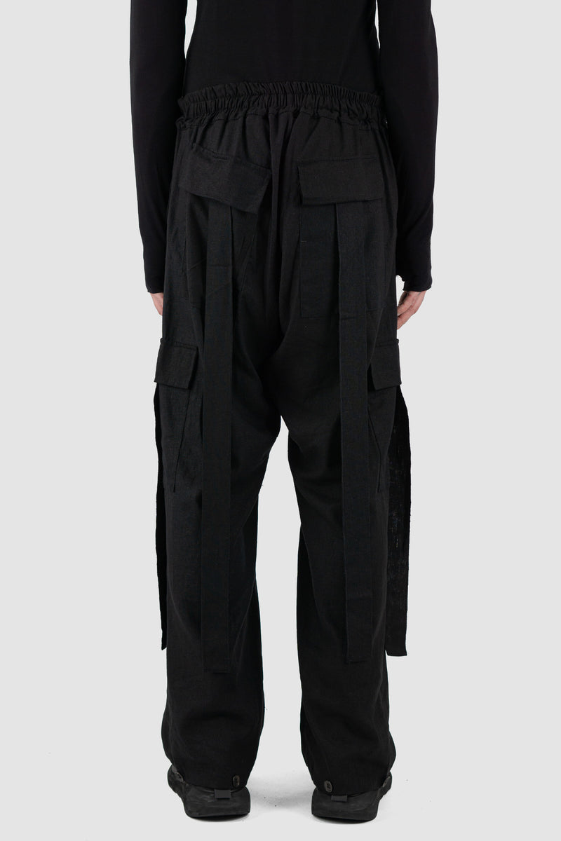 Back view of Black Linen-Viscose Cargo Pants for Men with transformable leg length, LA HAINE INSIDE US