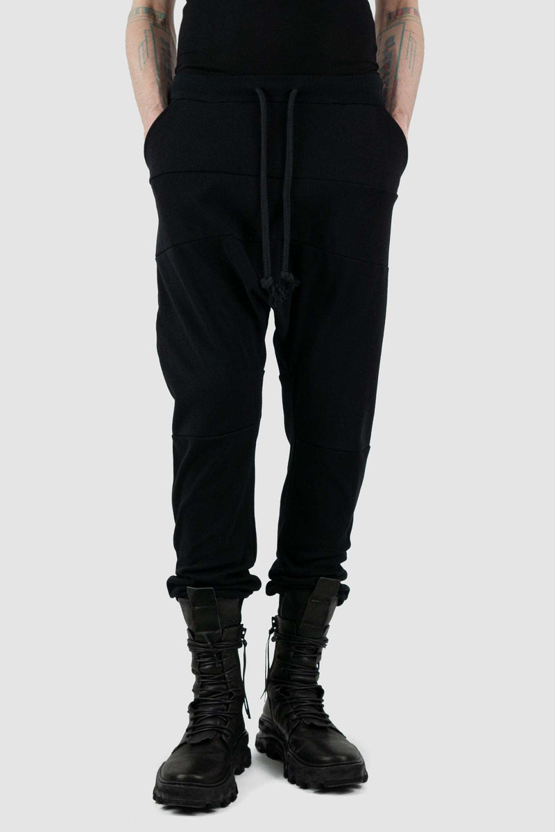 Detail view of Black Luna Sweatpants for Men with relaxed fit and low crotch, OBECTRA