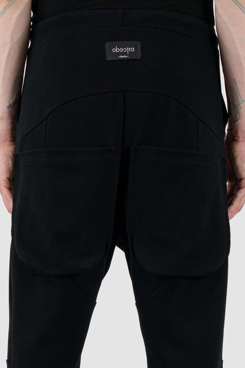 Back detail view of Black Luna Sweatpants for Men with relaxed fit and low crotch, OBECTRA