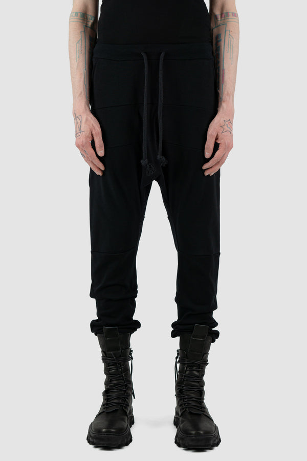 Front view of Black Luna Sweatpants for Men with relaxed fit and low crotch, OBECTRA