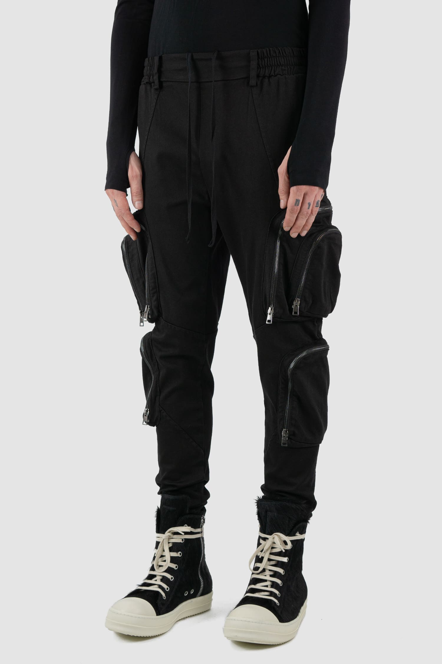 La Haine Inside Us - front side view of black cargo trousers with zipper.