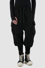 La Haine Inside Us - legere view of black men's heavy cotton baggy cargo sweatpants with high hem at the ankle, adjustable waistband, FW24 collection.