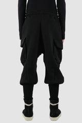 La Haine Inside Us - back view of black men's heavy cotton baggy cargo sweatpants with high hem at the ankle, adjustable waistband, FW24 collection.