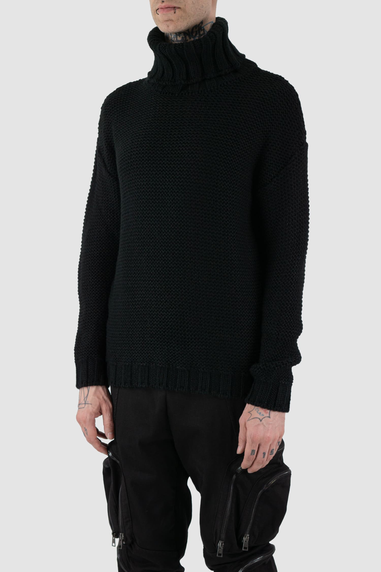 La Haine Inside Us - front side view of black high neck waffle knit sweater for men.