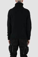 La Haine Inside Us - back view of black high neck waffle knit sweater for men from the FW24 collection with a solid, thicker neck, dropped shoulders and a straight fit.