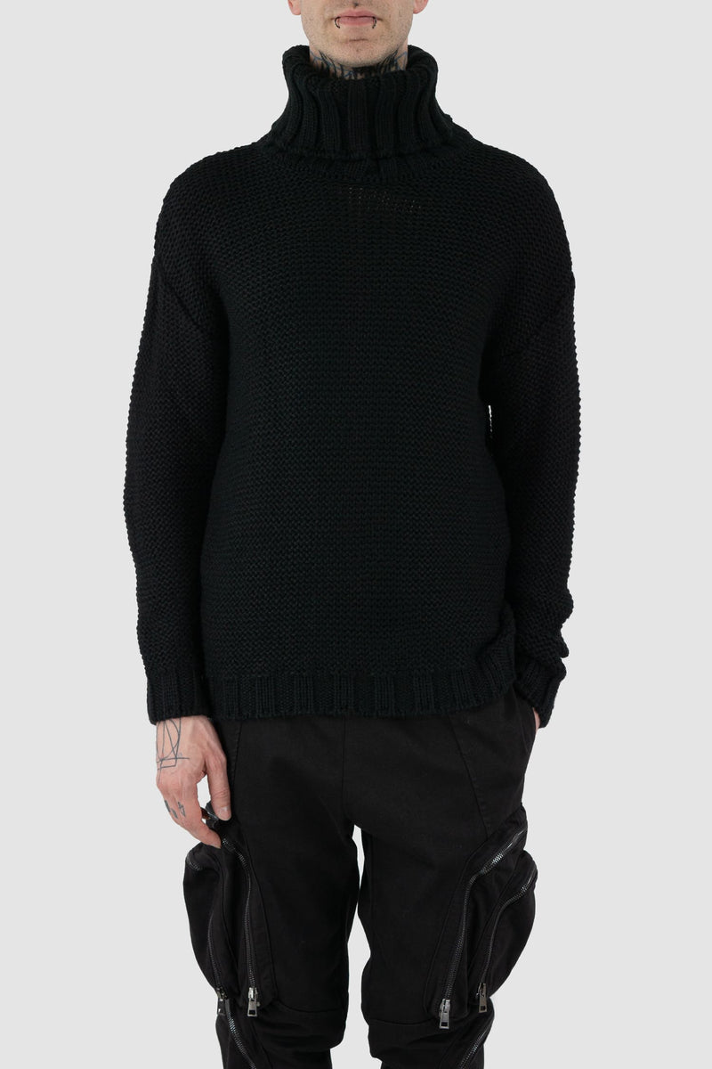 La Haine Inside Us - front relax view of black high neck waffle knit sweater for men from the FW24 collection with a solid, thicker neck, dropped shoulders and a straight fit.