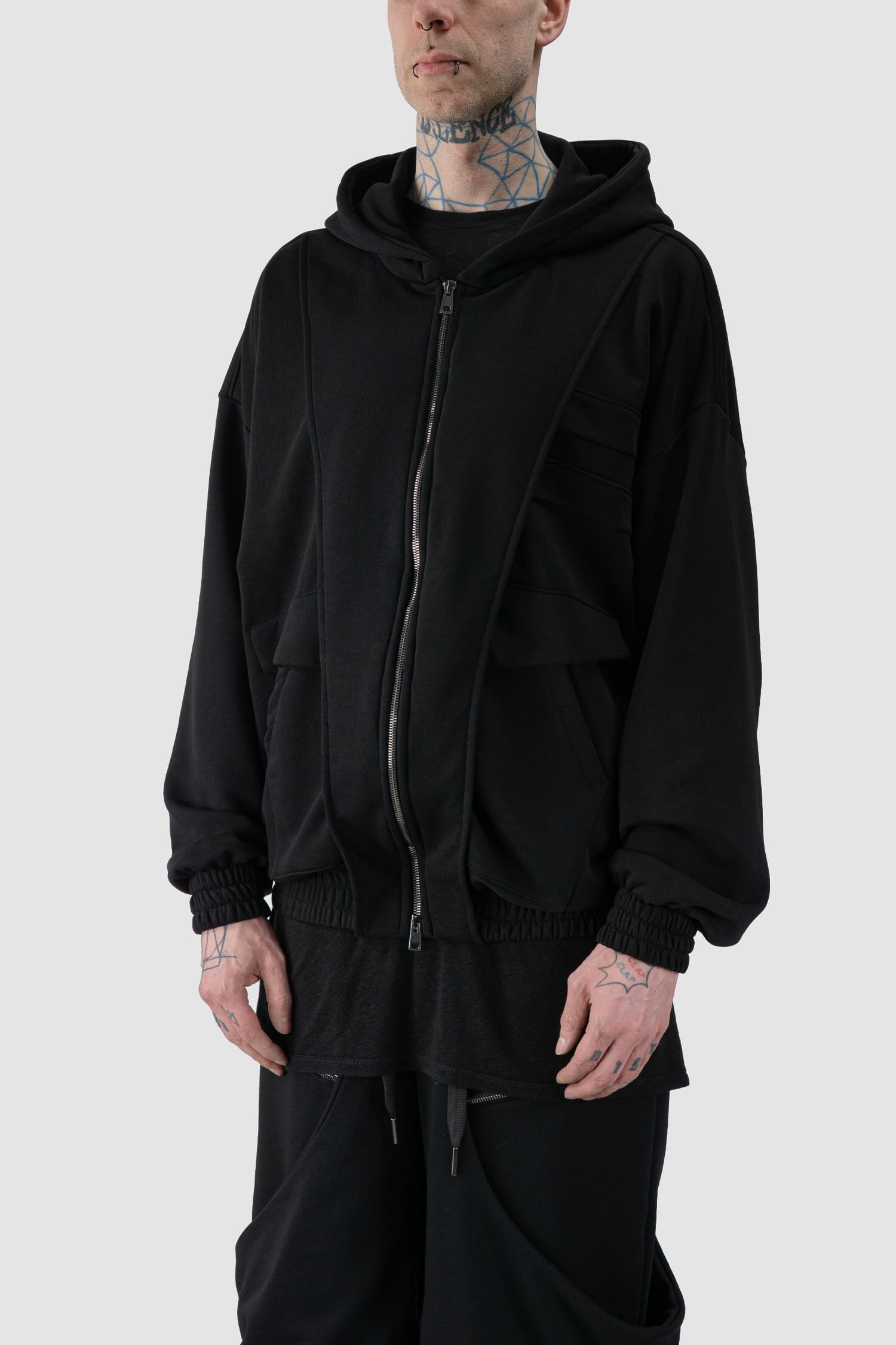 La Haine Inside Us - front side view of black Hooded Oversized Paneled Sweat Jacket