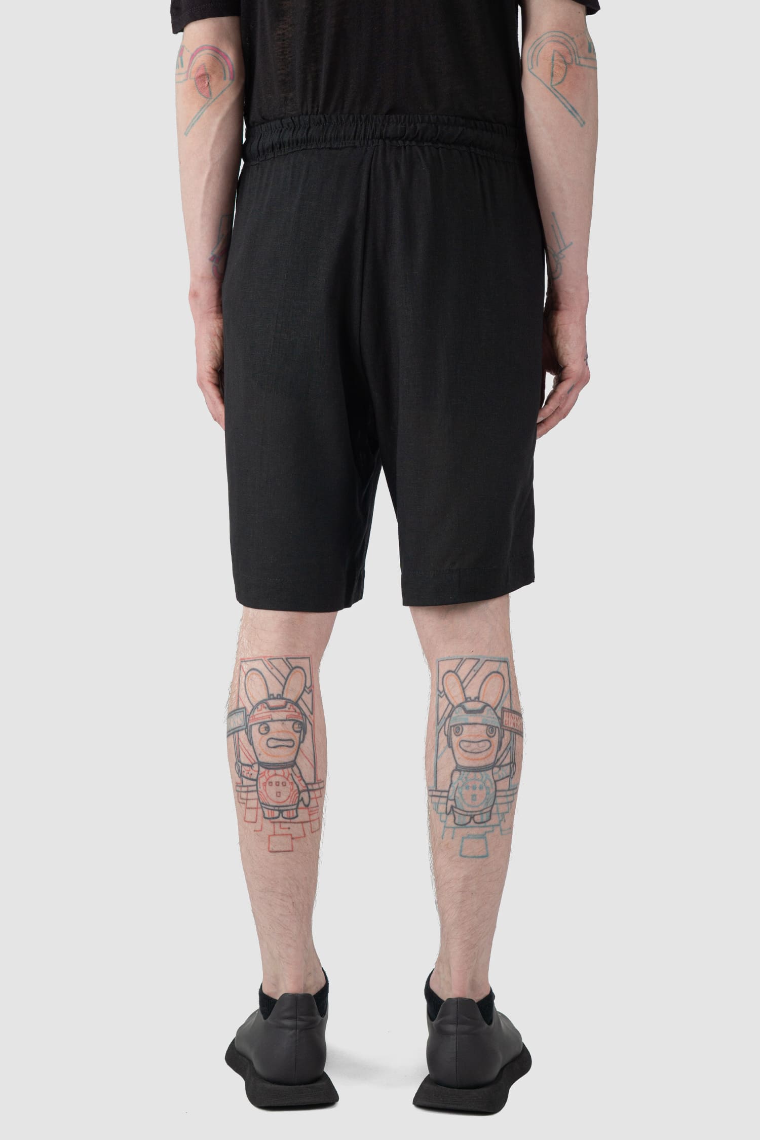 La Haine Inside Us - back view of black Linen Blend Bermuda Shorts