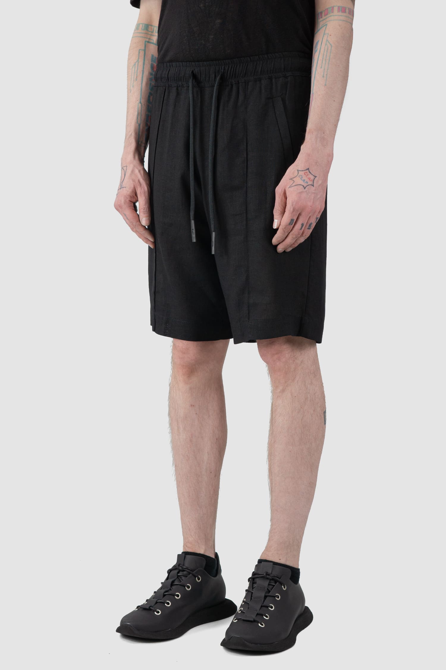 La Haine Inside Us - front side view of black Linen Blend Bermuda Shorts