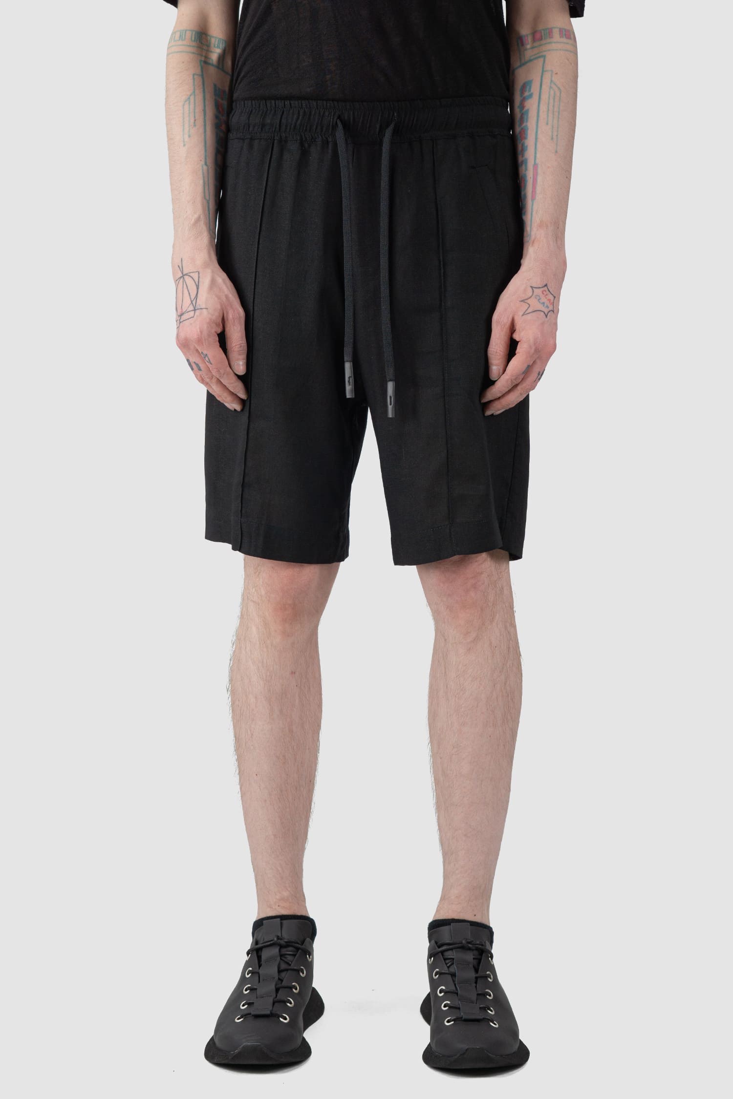 La Haine Inside Us - front view of black Linen Blend Bermuda Shorts
