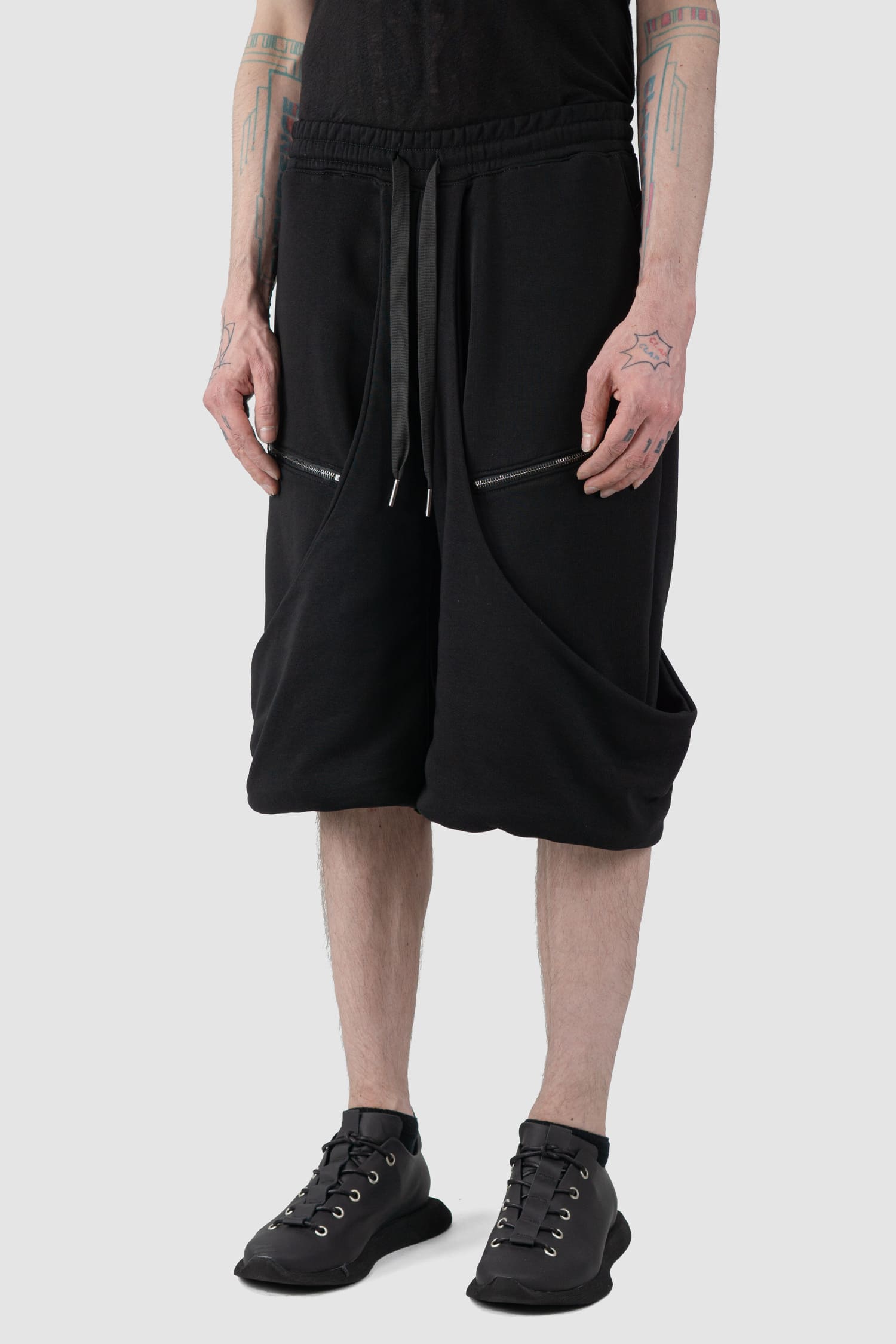 La Haine Inside Us - front side view of black Relaxed Wrapped Panel Sweat Shorts