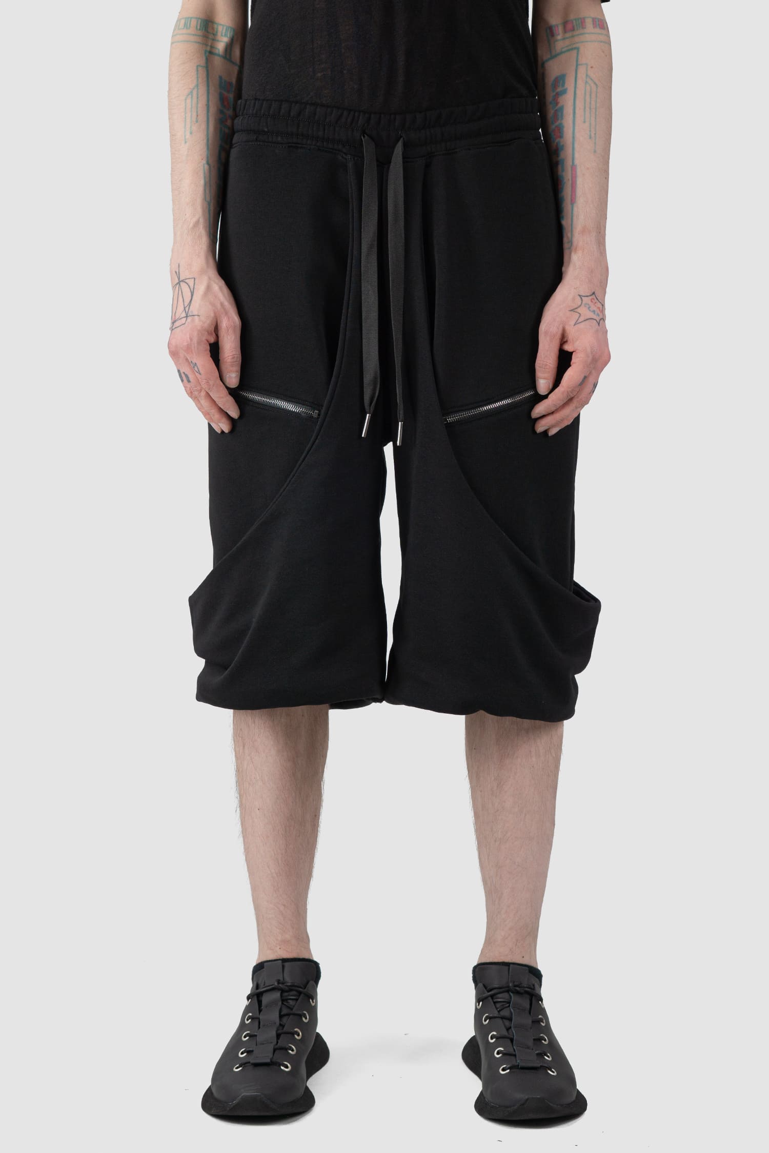 La Haine Inside Us - front view of black Relaxed Wrapped Panel Sweat Shorts