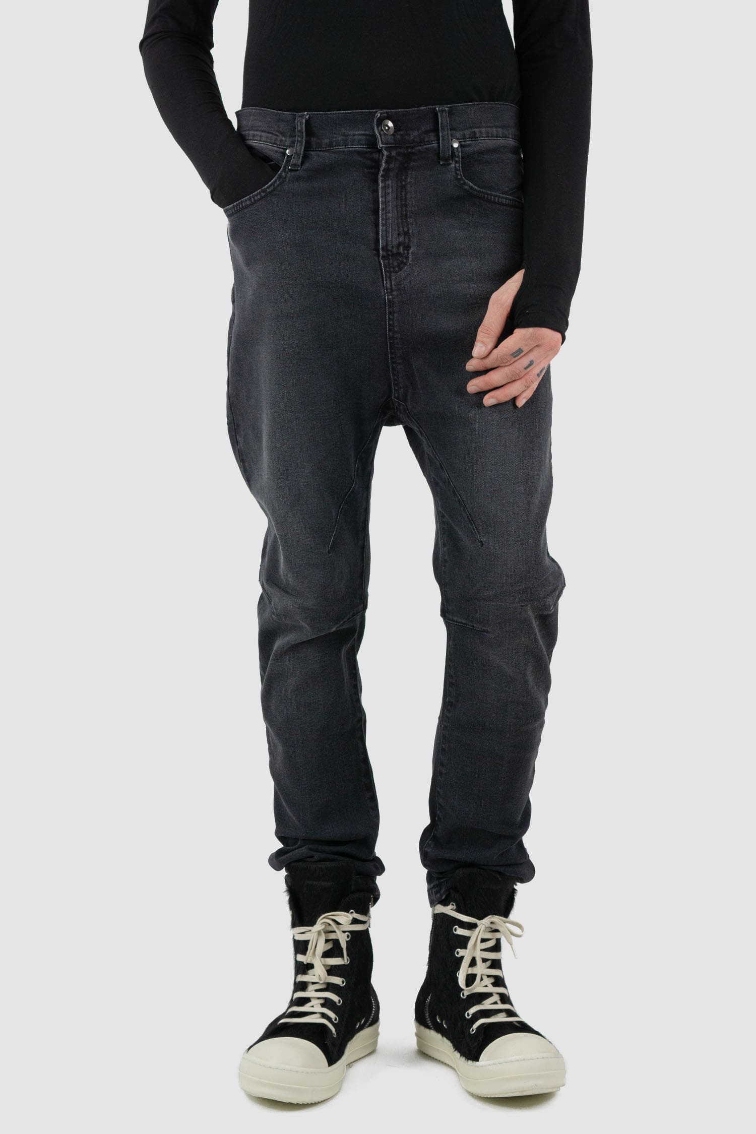 La Haine Inside Us - Front legere view of washed black men's slim fit stretch jeans with knee seam details, patch back pockets, FW24 collection.