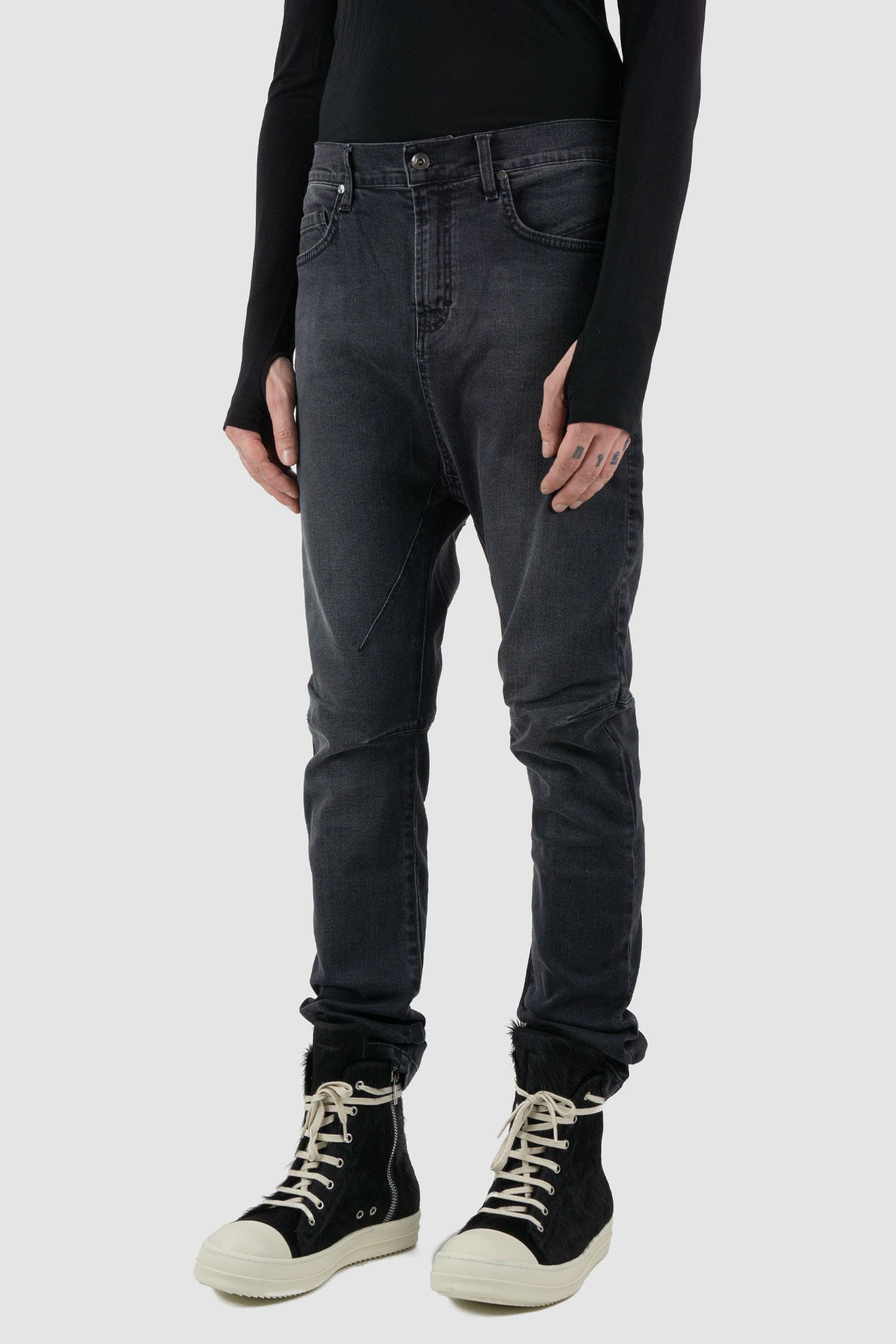 La Haine Inside Us - Front side view of washed black men's slim fit stretch jeans.