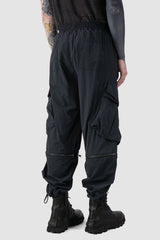 La Haine Inside us - back side view of Black Utility Transform Cargo Pocket Trousers