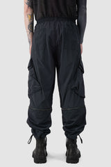 La Haine Inside us - back view of Black Utility Transform Cargo Pocket Trousers