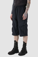 La Haine Inside us - front side view of Black Utility Transform Cargo Pocket Trousers