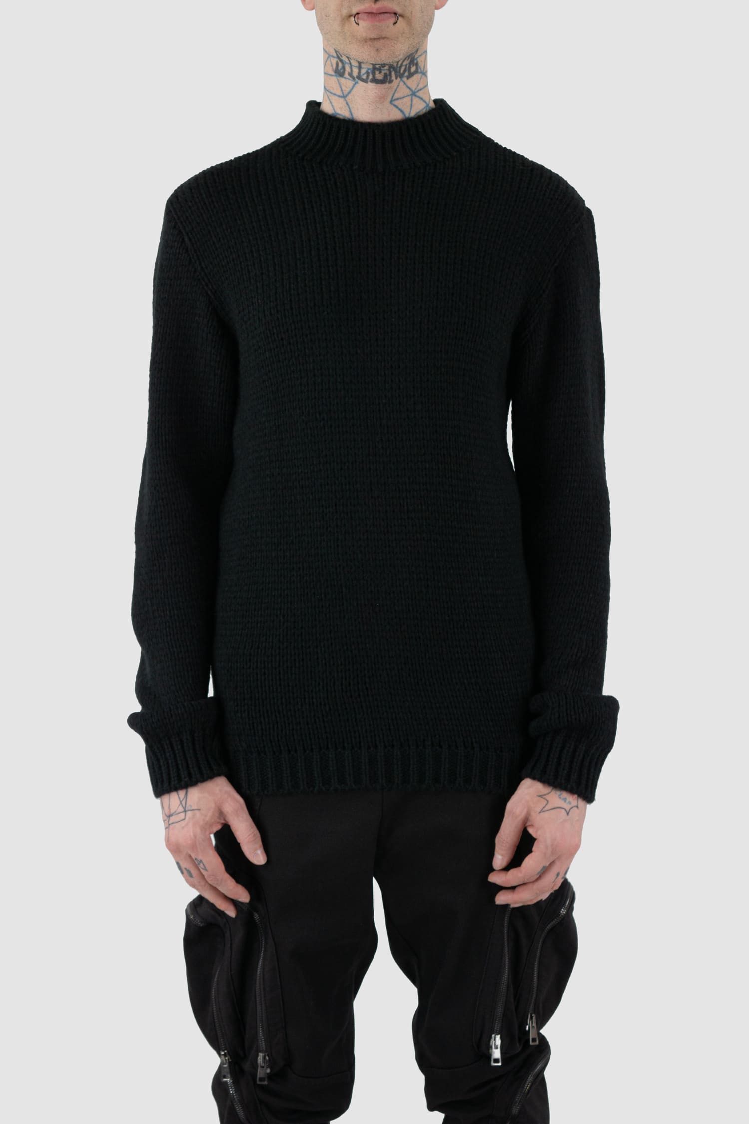La Haine Inside Us - front view of black wool blend knit sweater for men from the FW24 collection with a thicker neck, hem- and cuffs and a straight fit.