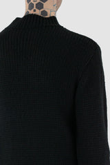 La Haine Inside Us - back detail view of black wool blend knit sweater for men from the FW24 collection with a thicker neck, hem- and cuffs and a straight fit.