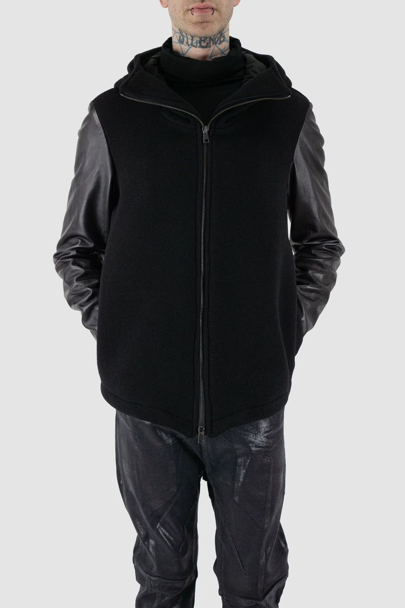 La Haine Inside Us - legere front view of black wool jacket with hood and leather Sleeves for Men from the FW24 Collection with two way zipper.