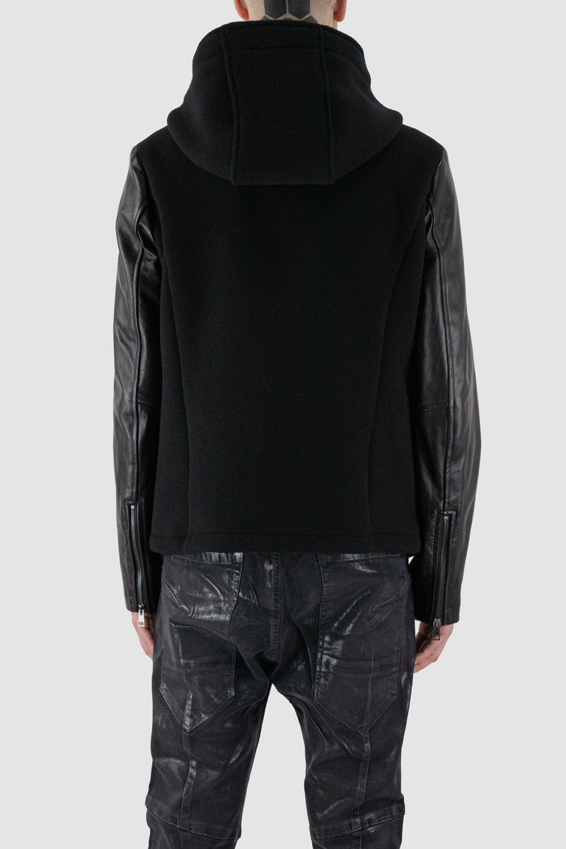 La Haine Inside Us - back view of black wool jacket with hood and leather Sleeves for Men from the FW24 Collection with two way zipper.