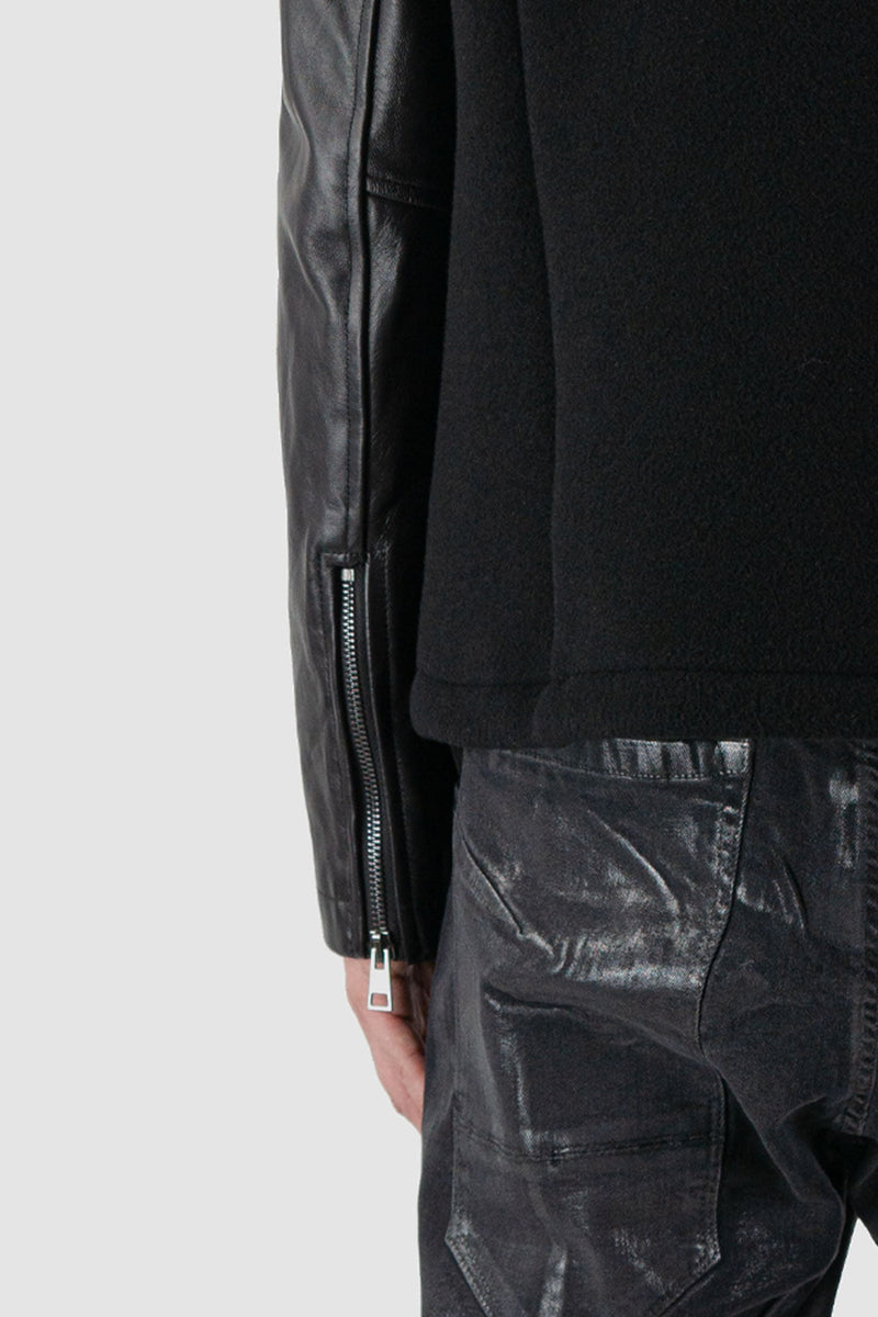 La Haine Inside Us - back detail view of black wool jacket with hood and leather Sleeves for Men from the FW24 Collection with two way zipper.