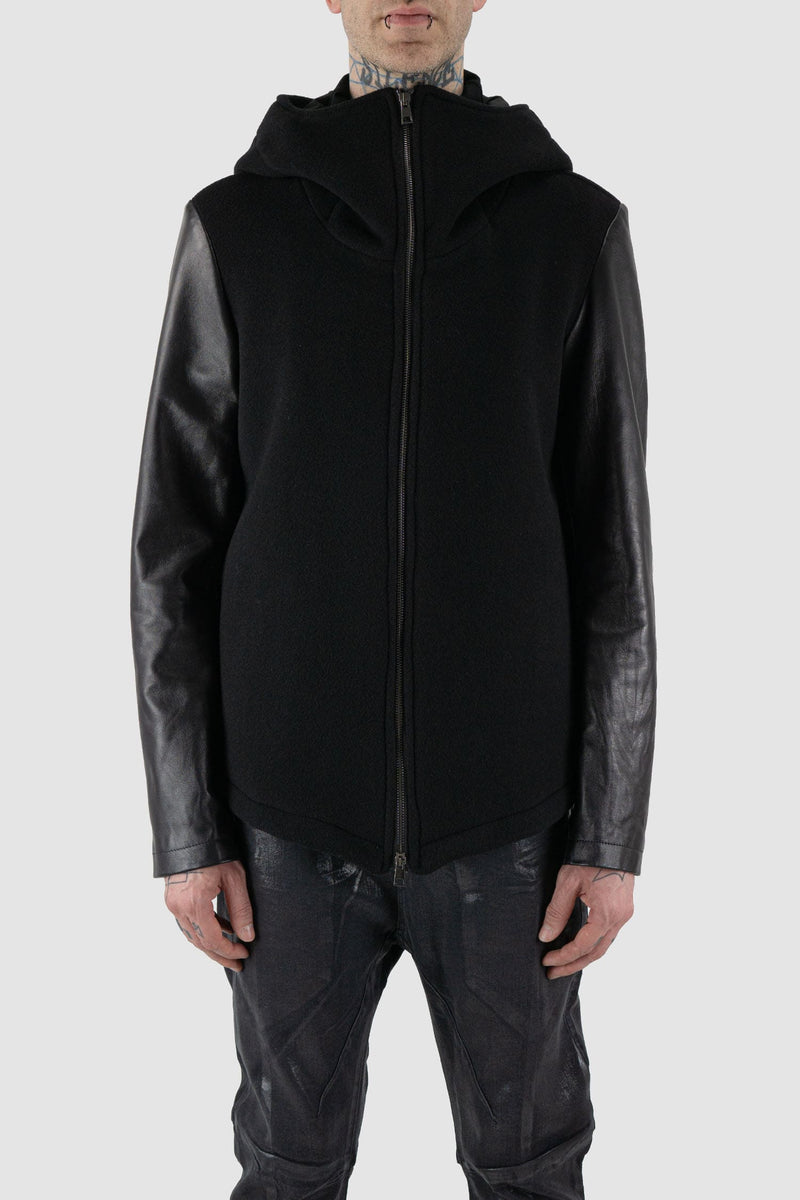 La Haine Inside Us - front view of black wool jacket with hood and leather Sleeves for Men from the FW24 Collection with two way zipper.