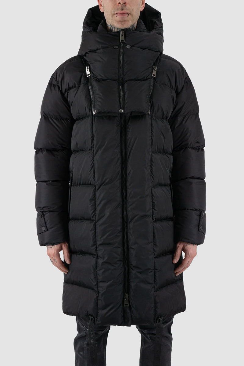 La Haine Inside Us - Front view of black men's long padded puffer coat with detachable hood, zippered pockets, two-way zipper, FW24 collection.