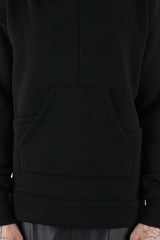 La Haine Inside Us - Front detail view of black men's sweater with removable hood, kangaroo pockets, FW24 collection