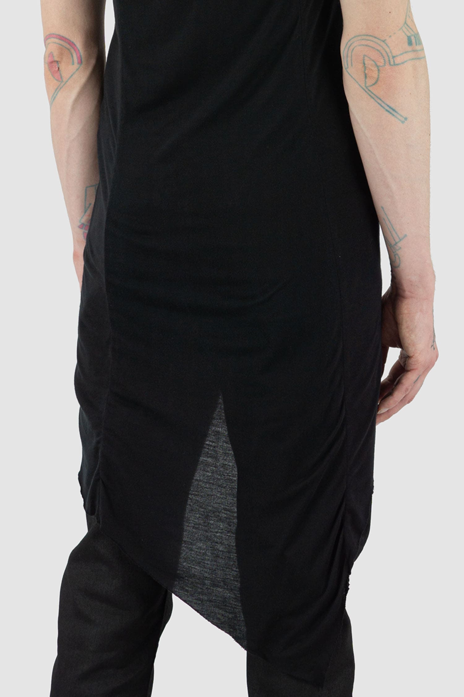 Leon Louis - back hem view of black Amber muscle tank top with wide shoulders, loose fit, men's Permanent Collection.