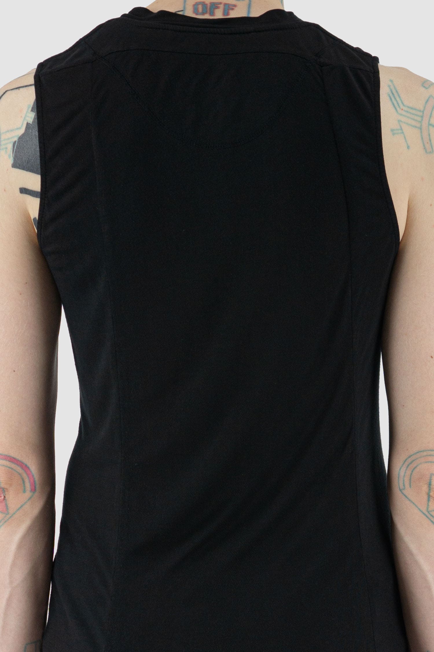 Leon Louis - back detail view of black Amber muscle tank top with wide shoulders, loose fit, men's Permanent Collection.